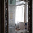 Дзеркало з фацетом в рамці